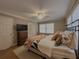 Inviting main bedroom with ample natural light and closet space at 1894 Dogwood Ct, Snellville, GA 30078