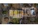 Aerial view showing lot lines of property including the house and wooded acreage at 3192 Highway 411 Ne, White, GA 30184
