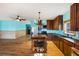 Bright and airy kitchen with custom wood cabinetry and eat in dining at 3192 Highway 411 Ne, White, GA 30184