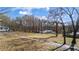 Property includes a long driveway, wooded acreage and a house at 3192 Highway 411 Ne, White, GA 30184