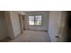 Bedroom featuring carpeted floors, neutral paint, and a closet at 3307 York Pl, Decatur, GA 30032