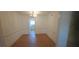 Traditional dining area featuring wainscoting, chandelier lighting, and hardwood floors at 3307 York Pl, Decatur, GA 30032