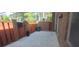 Enclosed patio area featuring a concrete slab, brick accents, and a wood fence at 3307 York Pl, Decatur, GA 30032