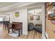 Basement hangout space with beanbag chairs and room for activities; includes wine storage and beverage station at 4590 Gablestone Xing, Hoschton, GA 30548
