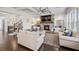 Comfortable living room with coffered ceilings, fireplace, and stylish decor at 4590 Gablestone Xing, Hoschton, GA 30548