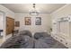 Cozy basement playroom with beanbag chairs, shelving unit and storage for toys and games at 4590 Gablestone Xing, Hoschton, GA 30548