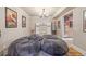 Finished basement playroom with beanbag chairs, built-in storage, and stylish decor at 4590 Gablestone Xing, Hoschton, GA 30548