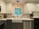 Kitchen with quartz countertops and modern stainless steel faucet at 3478 Grant Nw Dr, Kennesaw, GA 30144