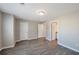 Bedroom with hardwood floors, a hall closet, and 2 doors - one to the hallway and one to the bathroom at 402 Whippet St, Union City, GA 30291