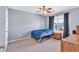Bedroom with a full size bed, ceiling fan and window with curtains at 510 Pinchot Way, Woodstock, GA 30188