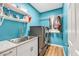 Laundry room featuring washer and dryer, utility sink and shelving at 510 Pinchot Way, Woodstock, GA 30188