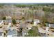 Aerial view of a home with a well-manicured front yard and a two-car garage in a lush neighborhood at 6268 Braidwood Nw Run, Acworth, GA 30101