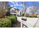 Charming two-story home with a white brick exterior, manicured landscaping, and a two-car garage at 6268 Braidwood Nw Run, Acworth, GA 30101