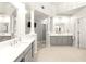 Bright bathroom with double sinks, ample counter space, and a separate vanity area at 650 Vinings Estates Se Dr, Mableton, GA 30126