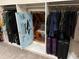 Closet with racks and attic access with foam board covering the entrance at 650 Vinings Estates Se Dr, Mableton, GA 30126