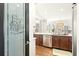 Bright kitchen featuring stainless steel appliances, granite countertops, and a large pantry at 650 Vinings Estates Se Dr, Mableton, GA 30126