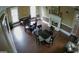 Meeting room with hardwood floors, fireplace, and several tables and chairs at 650 Vinings Estates Se Dr, Mableton, GA 30126