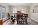 Bright dining room with wood-look floors and ample natural light at 8951 Brewer Rd, Douglasville, GA 30134
