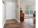 Inviting entryway featuring wood-look flooring and a view to the living area at 8951 Brewer Rd, Douglasville, GA 30134