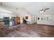 Open floor plan showcasing the kitchen, dining and living areas, filled with light and modern touches at 8951 Brewer Rd, Douglasville, GA 30134