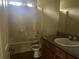 Bathroom with a shower-tub combination and a sink with a vanity at 312 Lauren Dr, Fairburn, GA 30213