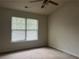 Bedroom with a window providing ample natural light at 312 Lauren Dr, Fairburn, GA 30213