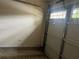 View of a garage and garage door with windows at 312 Lauren Dr, Fairburn, GA 30213