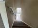 View of staircase leading to the front door and natural light at 312 Lauren Dr, Fairburn, GA 30213