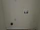 Laundry hookups with electrical outlets and water valves at 312 Lauren Dr, Fairburn, GA 30213