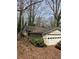 A side view of the home, including the garage and portions of the roofline at 4028 William Mary Ct, Decatur, GA 30034