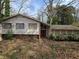 Classic home design nestled among mature trees and landscaping at 4028 William Mary Ct, Decatur, GA 30034
