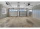 Spacious two-car garage with windows for natural light, offering ample parking and storage space at 6691 Birch Dr, Winston, GA 30187