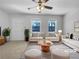 Bright living room with modern furnishings and a stylish striped rug, virtually staged for inspiration at 6691 Birch Dr, Winston, GA 30187