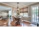 Cozy dining area with wood floors and a view into the living room at 2825 Parnell Springs Ct, Cumming, GA 30040
