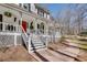 Charming front porch with lattice work, steps, and landscaping at 2825 Parnell Springs Ct, Cumming, GA 30040