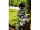 Whimsical metal garden decor adds a touch of charm and character to the lush, green outdoor space at 2825 Parnell Springs Ct, Cumming, GA 30040