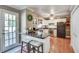 Cozy kitchen with granite countertops, stainless appliances, and a breakfast bar at 2825 Parnell Springs Ct, Cumming, GA 30040