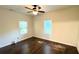 Bedroom with natural light, hardwood flooring and ceiling fan at 8083 Highway 166, Douglasville, GA 30135
