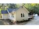 Home exterior with a well maintained lawn and new siding at 8083 Highway 166, Douglasville, GA 30135