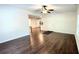 The living room features new dark floors at 8083 Highway 166, Douglasville, GA 30135
