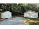 A storage building and a garage sit on the property at 8083 Highway 166, Douglasville, GA 30135