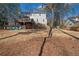 Home exterior showcasing a two-story deck overlooking a spacious backyard, with potential for landscaping and outdoor enjoyment at 1835 Tree Top Way, Marietta, GA 30062