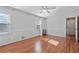 Inviting bedroom with hardwood floors, natural light and neutral paint at 1835 Tree Top Way, Marietta, GA 30062