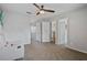 Expansive bedroom with plush carpeting and a cozy accent chair at 1835 Tree Top Way, Marietta, GA 30062