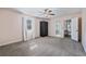 Light-filled bedroom with cozy carpet and access to an ensuite bathroom at 1835 Tree Top Way, Marietta, GA 30062