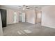 Expansive bedroom featuring plush carpeting and multiple doorways to adjacent rooms at 1835 Tree Top Way, Marietta, GA 30062