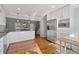 Spacious kitchen with hardwood floors, white cabinets, stainless steel appliances, and ample counter space at 1835 Tree Top Way, Marietta, GA 30062