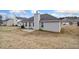 Spacious backyard with patio, offering a blank slate for outdoor enjoyment at 4768 Score Ct, Snellville, GA 30039