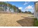 Expansive backyard with lush greenery and a sturdy wooden fence, providing privacy and plenty of space for outdoor enjoyment at 4768 Score Ct, Snellville, GA 30039
