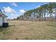 Large, grassy backyard with a privacy fence, perfect for pets and outdoor activities at 4768 Score Ct, Snellville, GA 30039